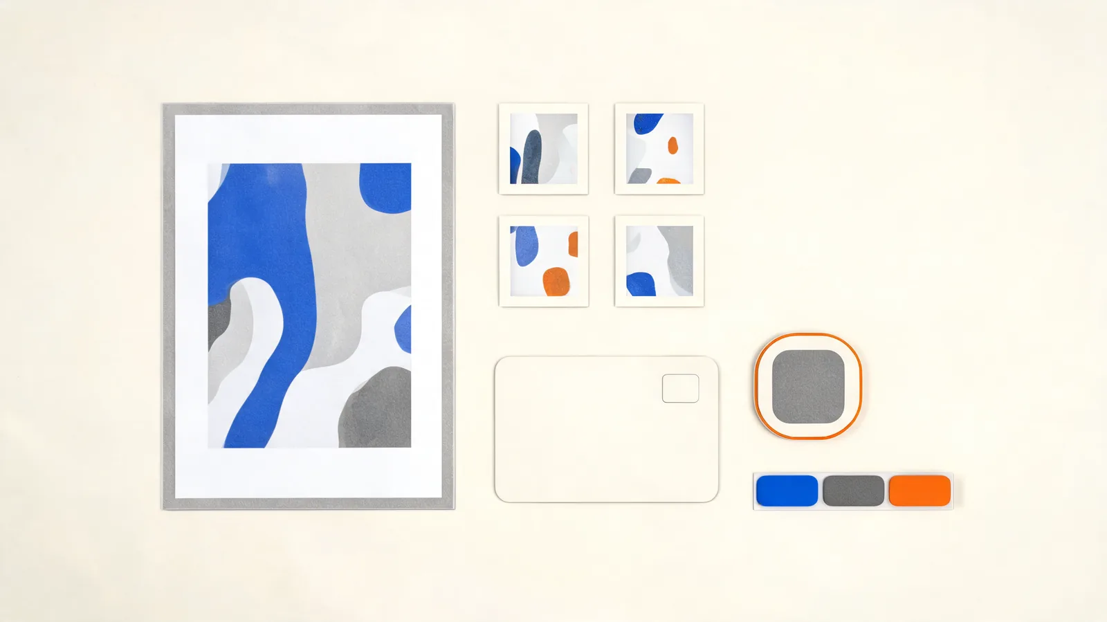 Top-down editorial workspace showing an abstract source-image card, separate small frame cards, neutral account and price shapes, and colored language-selector tabs